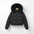 Black jacket on white studio wall