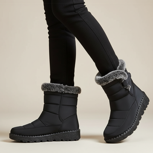 Standing winter boots pose two